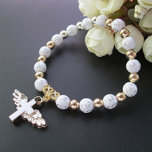 Pulsera con cruz y alas de ángel